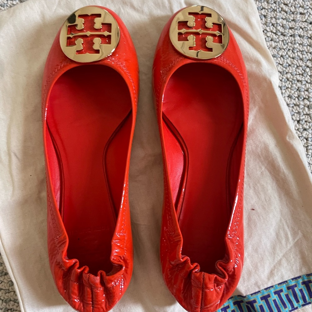 Tory Burch Bright Orange Flats with Gold Logo